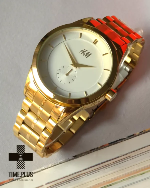 ساعت مچی زنانه اچ اند ام مدل زیر ثانیه طلایی
