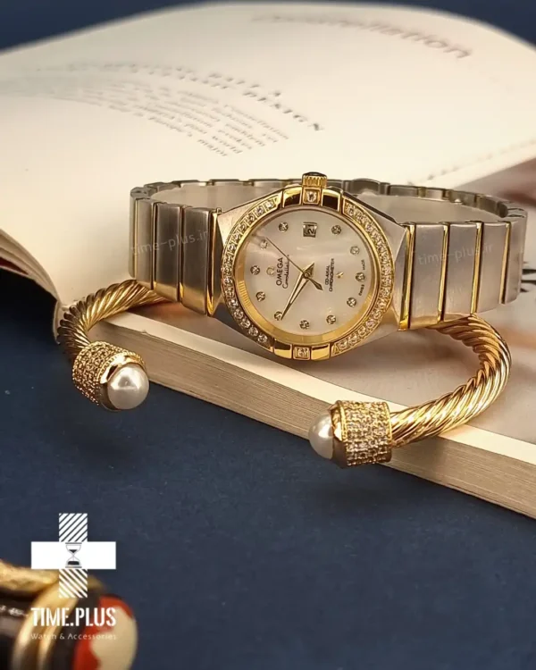 ساعت مچی زنانه امگا نقره ای و طلایی