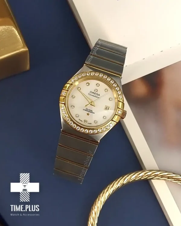 ساعت مچی زنانه امگا نقره ای و طلایی