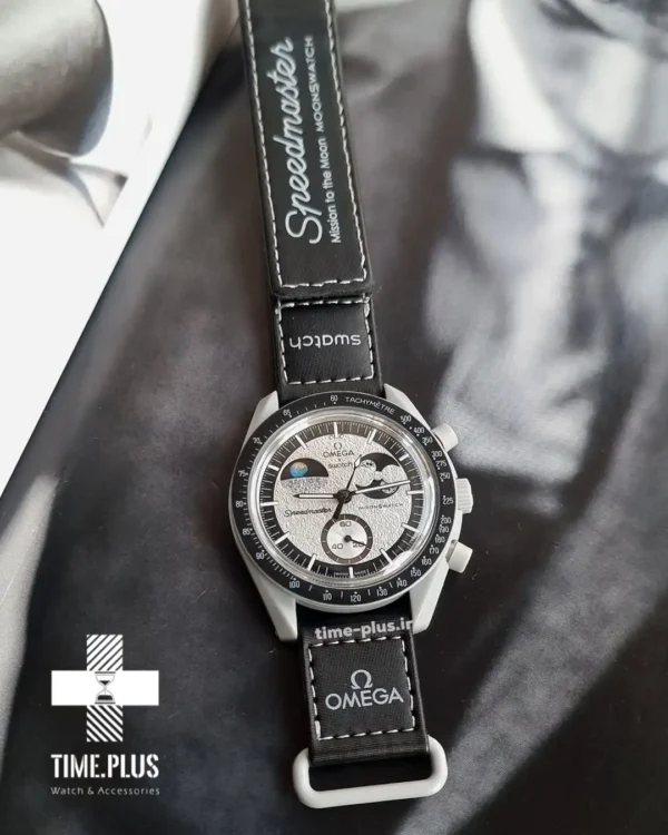 ساعت مچی زنانه امگاسواچ مدل Mission to Earthphase مشکی و طوسی