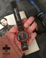 ساعت مچی مردانه امگاسواچ مدل Lava قرمز و مشکی