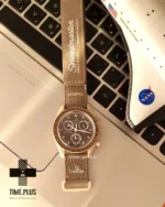 ساعت مچی زنانه امگاسواچ مدل Earth Desert قهوه ای