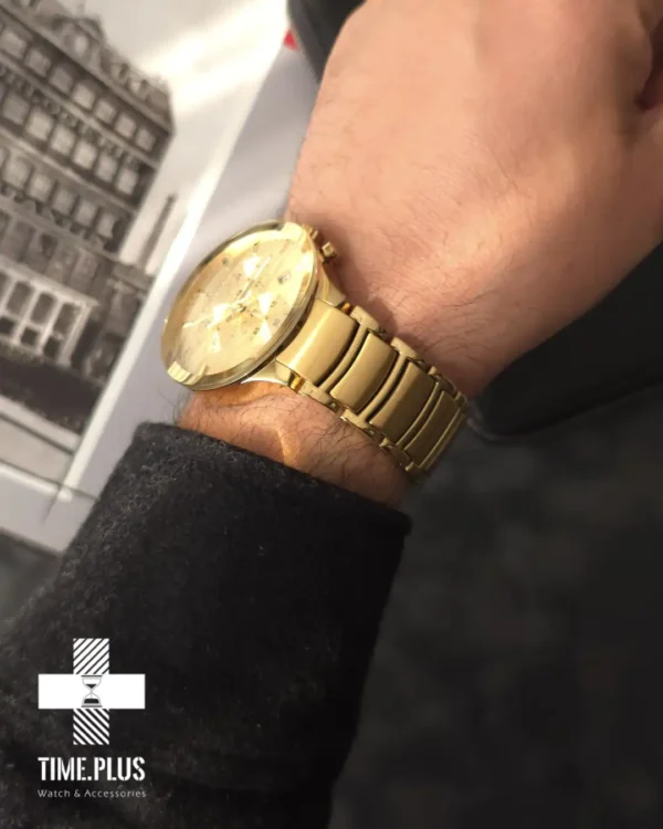 ساعت مچی مردانه رومانسون مدل کرنوگراف طلایی