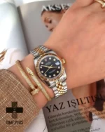 ساعت مچی زنانه رولکس مدل دیت جاست نقره ای و طلایی