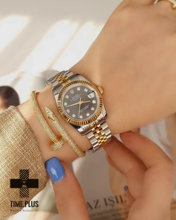 ساعت مچی زنانه رولکس مدل دیت جاست نقره ای و طلایی
